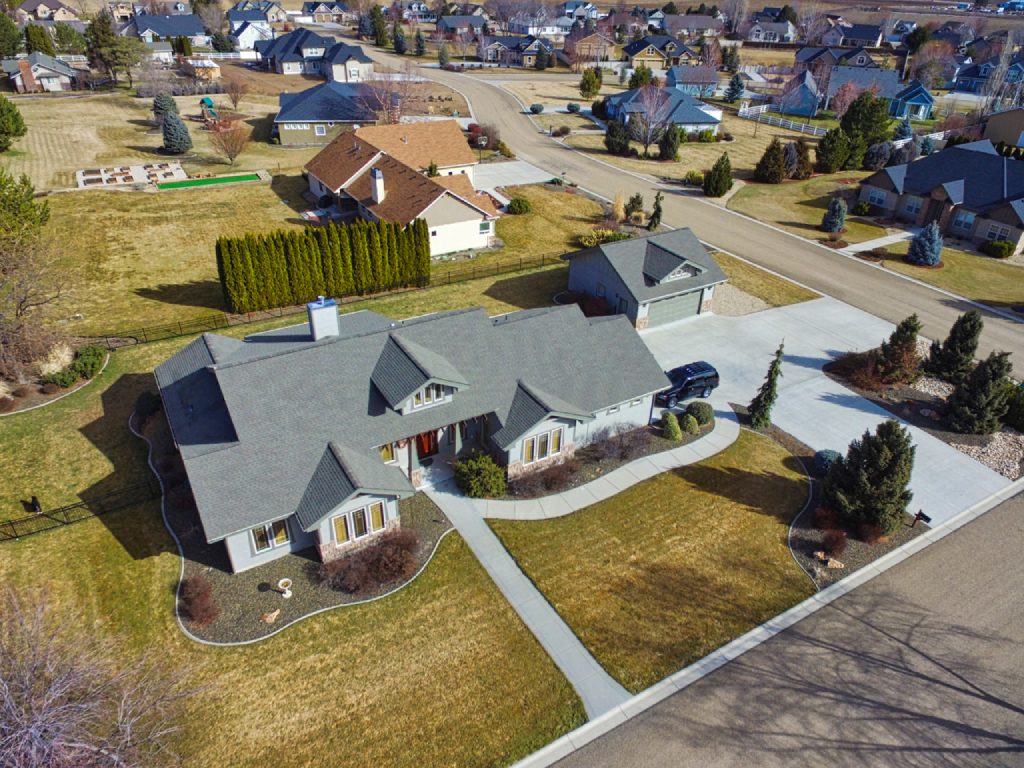 Caldwell Residential Neighborhood Aerial View with Mountain Backdrop.jpg