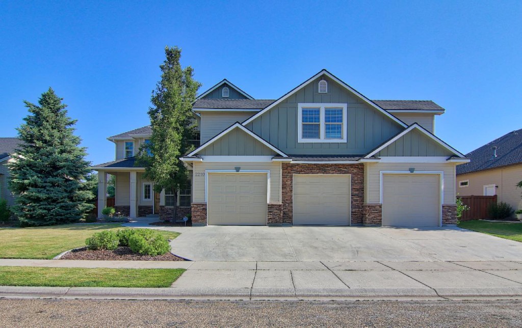 Meridian Light Blue Craftsman Home with Modern Trim.jpg