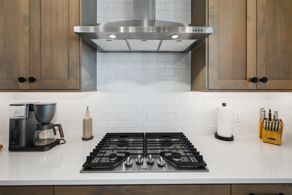 Kitchen Detail Modern Stainless Steel Gas Range with White Subway Tile.jpg (1)