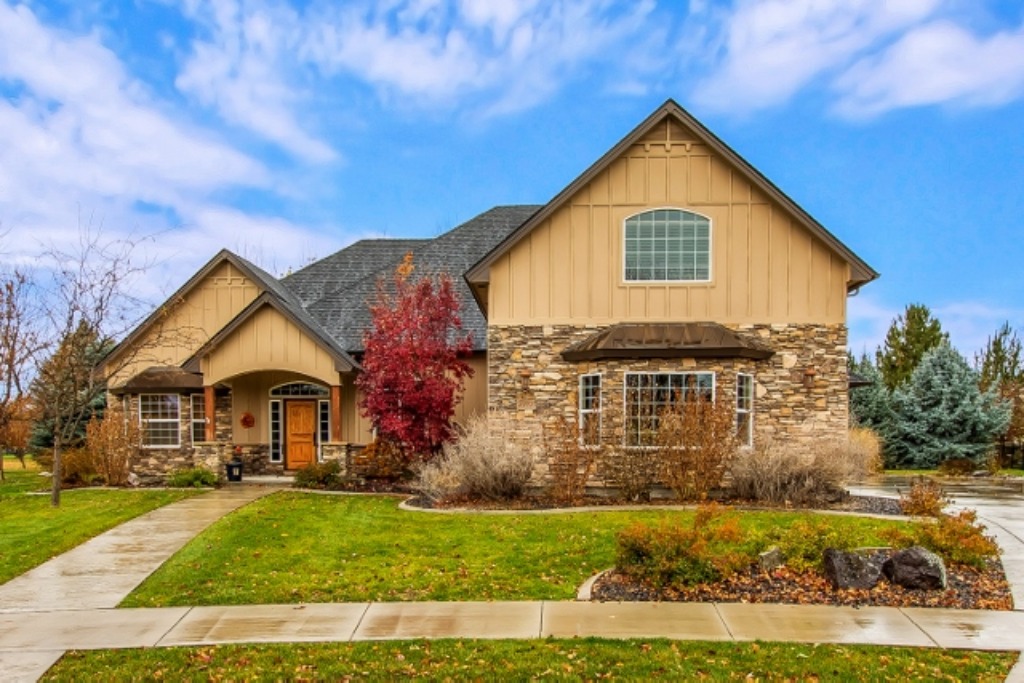 community classic two story craftsman with yellow siding and porch.jpg (1)
